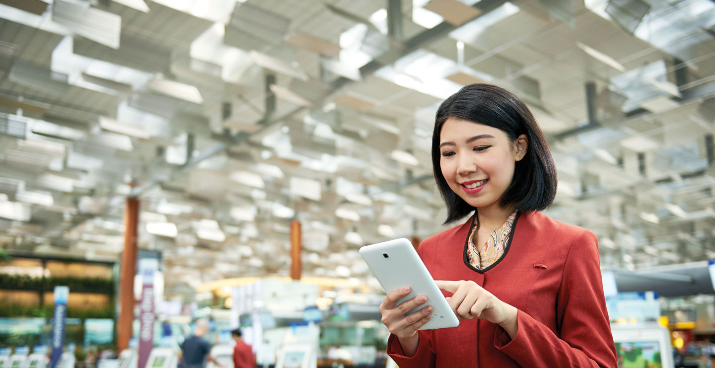 Customer service officer looking at tablet