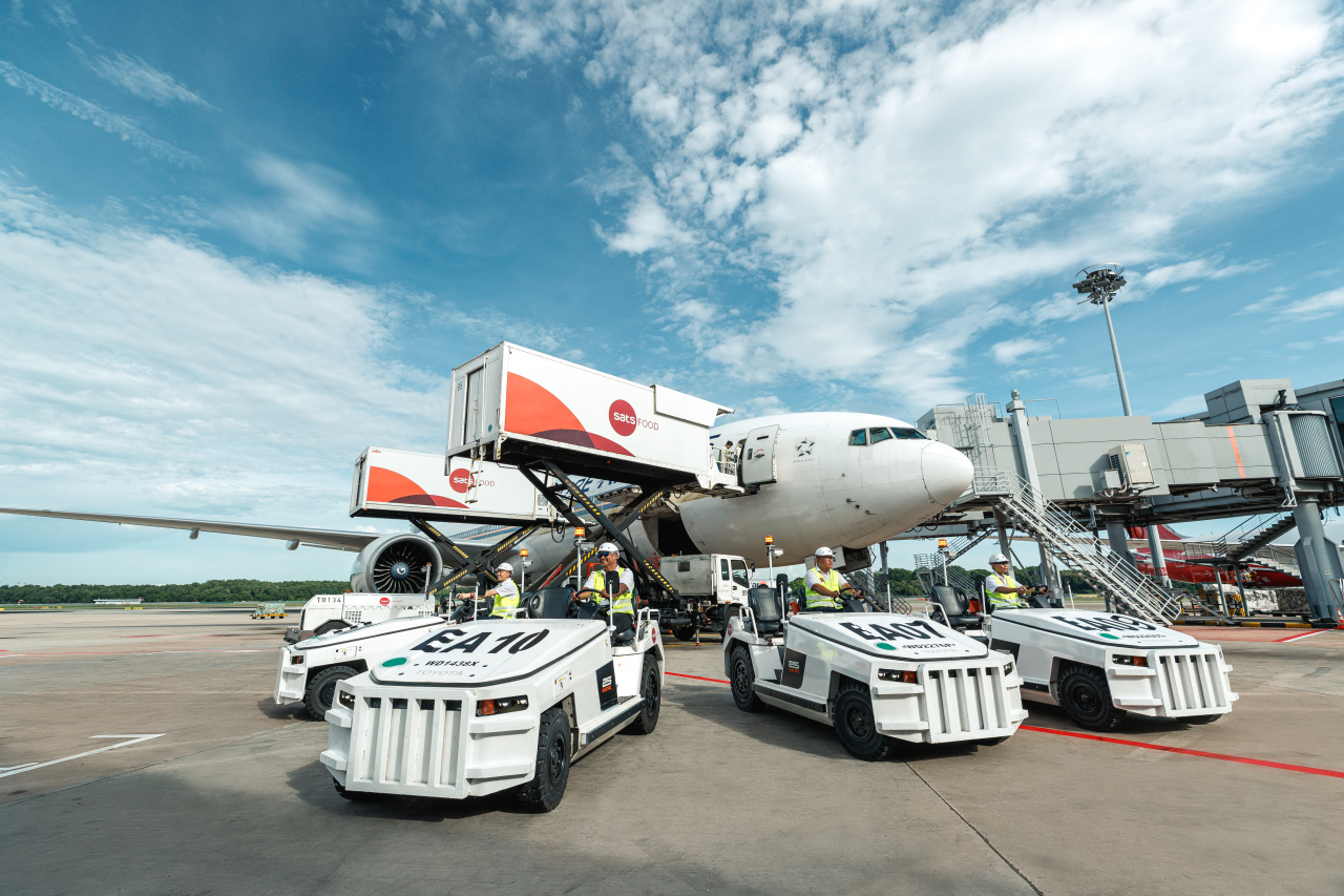 electric tractors on tarmac