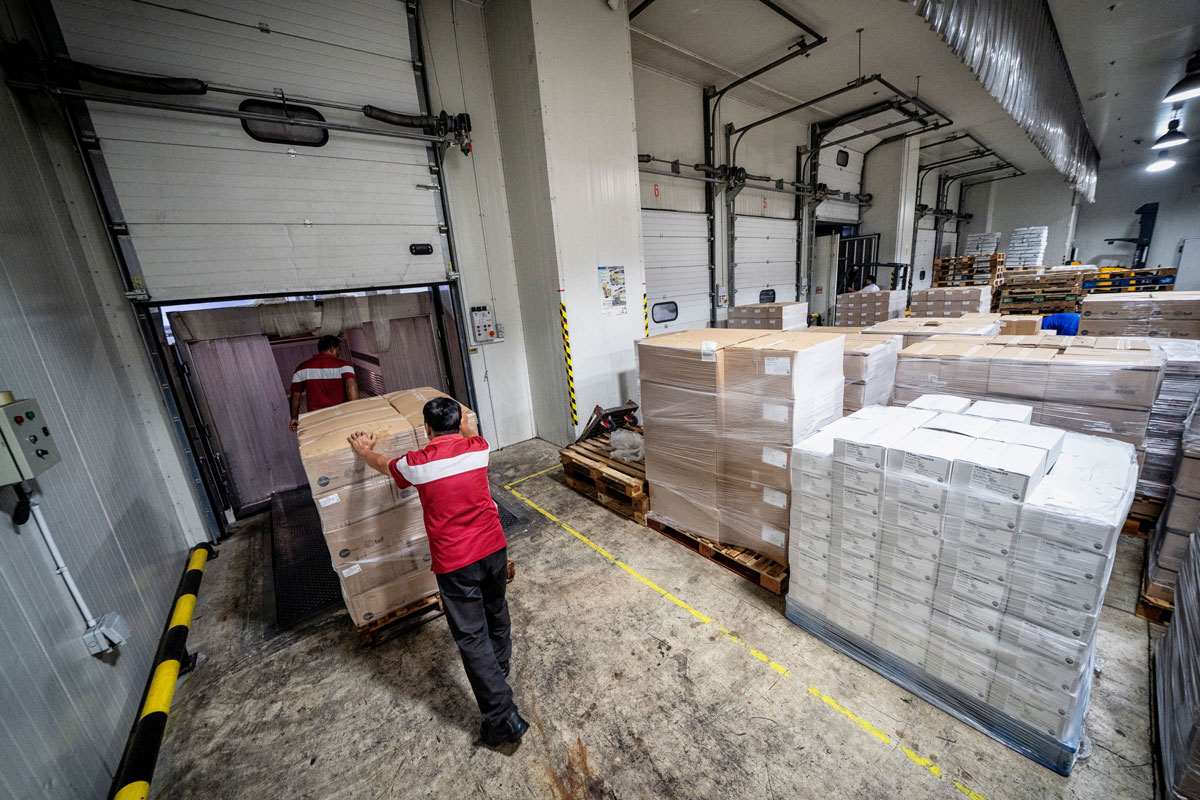 SATS BRF staff loading frozen meat for distribution