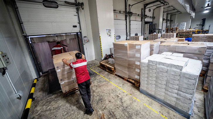 SATS BRF staff loading frozen meat for distribution