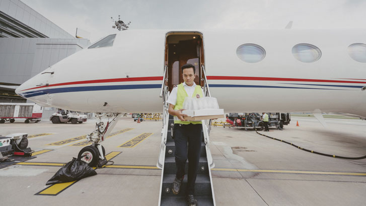 Man walking from Private Jet